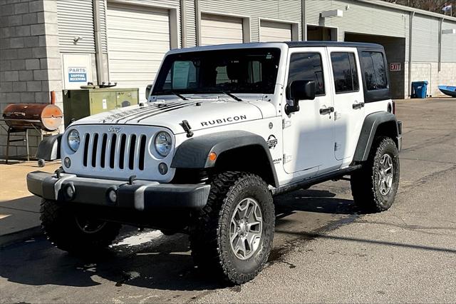 Used 2016 Jeep Wrangler Unlimited Rubicon with VIN 1C4BJWFGXGL262811 for sale in Olive Branch, MS