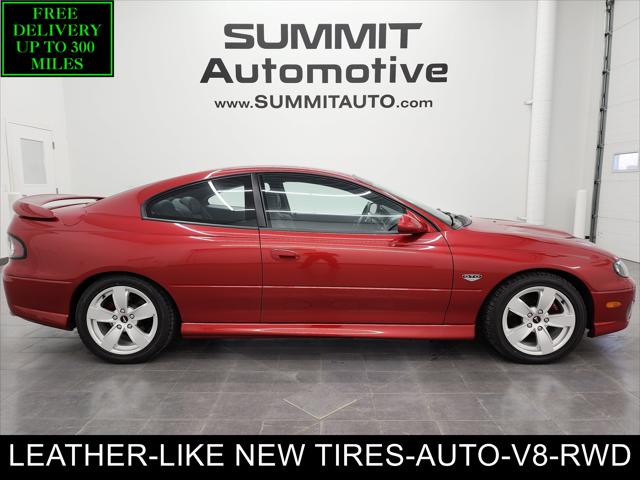 2006 Pontiac GTO Base: TWO DOOR-POWER LEATHER-6 CD-BLAUPUNKT SOUND-AUTO-6.0L V8