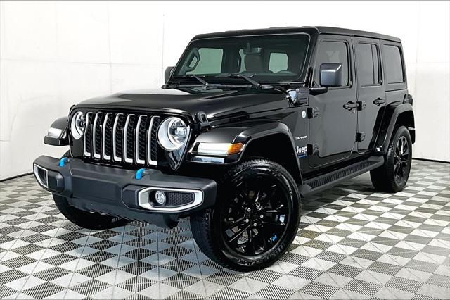 Used 2023 Jeep Wrangler 4xe Sahara 4XE with VIN 1C4JJXP67PW608982 for sale in Olive Branch, MS
