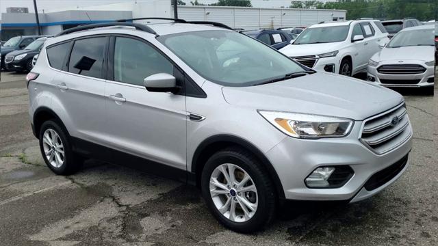 Used 2018 Ford Escape SE with VIN 1FMCU9GD1JUB82876 for sale in Waterford, MI