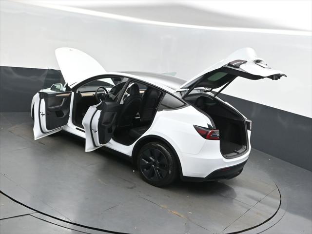 Used 2025 Tesla Model Y Long Range with VIN 7SAYGDEE0SA348699 for sale in Jackson, MS
