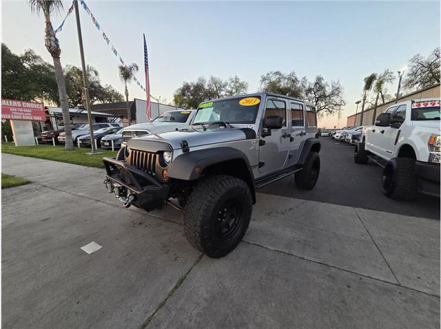 2013 Jeep Wrangler Unlimited Sport for sale in Farmersville, CA