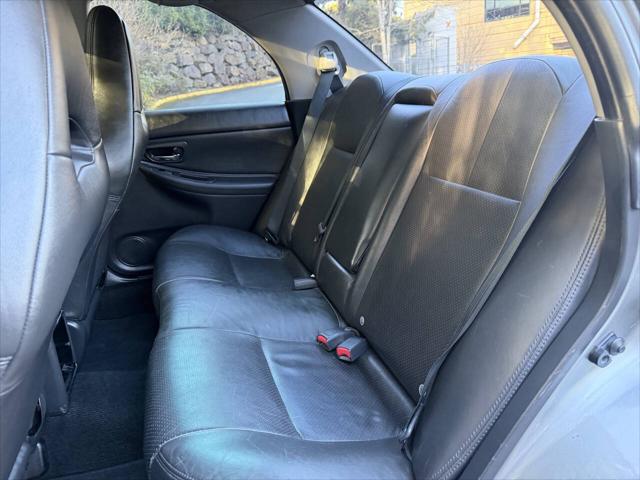 2007 Subaru Impreza WRX Limited AWD 4dr Sedan w/Black Interior (2.5L F4 5M)