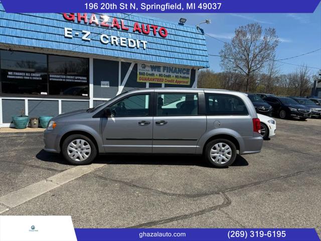 2014 Dodge Grand Caravan SE/SXT for sale in Springfield, MI