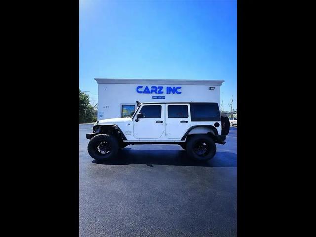 2014 Jeep Wrangler Unlimited Sport for sale in Jackson, TN