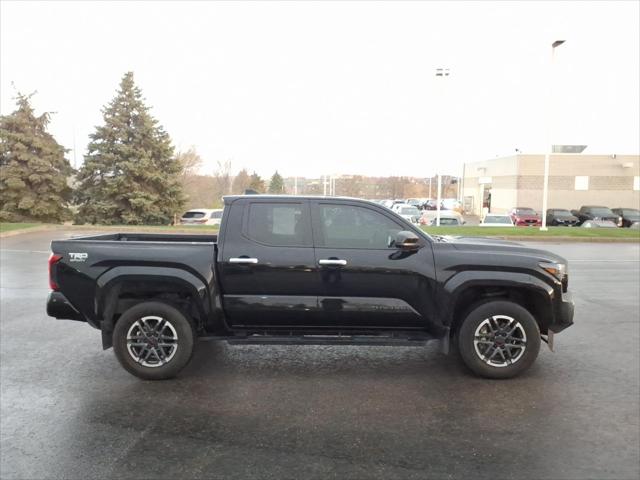 Used 2024 Toyota Tacoma TRD Sport with VIN 3TMKB5FN1RM004099 for sale in Burnsville, Minnesota