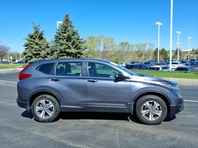 Used 2017 Honda CR-V LX with VIN 5J6RW6H3XHL008229 for sale in Burnsville, Minnesota