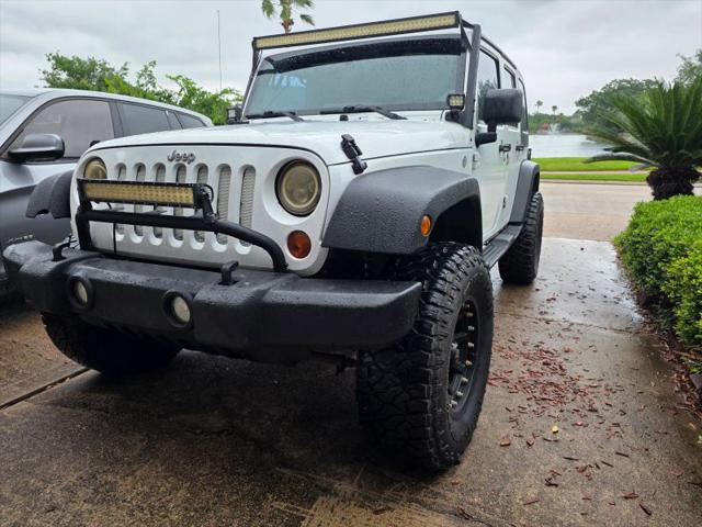 2011 Jeep Wrangler Unlimited Sport for sale in Houston, TX