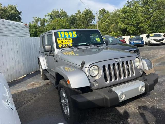 2014 Jeep Wrangler Unlimited Sahara for sale in Leesburg, FL