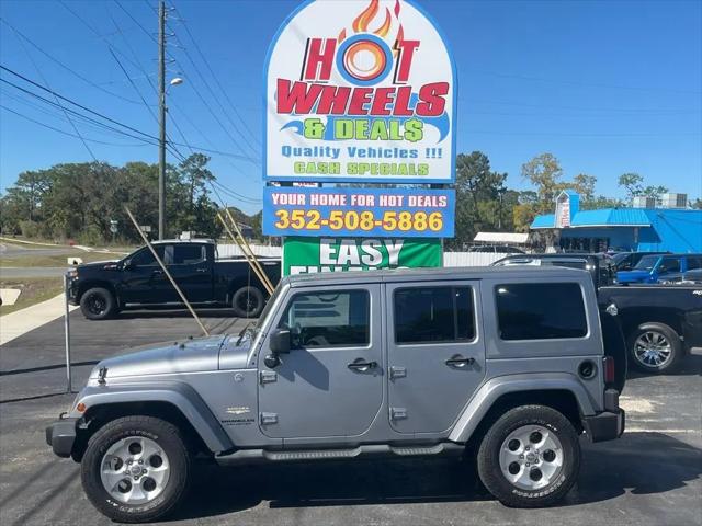 2014 Jeep Wrangler Unlimited Sahara for sale in Leesburg, FL