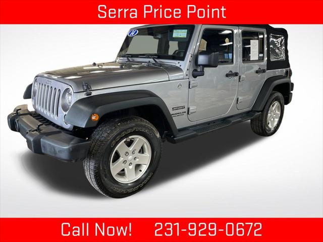 2014 Jeep Wrangler Unlimited Sport for sale in TRAVERSE CITY, MI