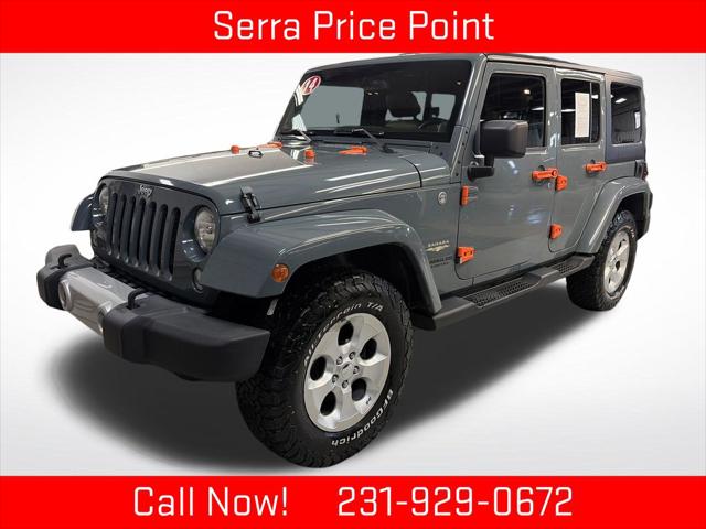 2014 Jeep Wrangler Unlimited Sahara for sale in TRAVERSE CITY, MI