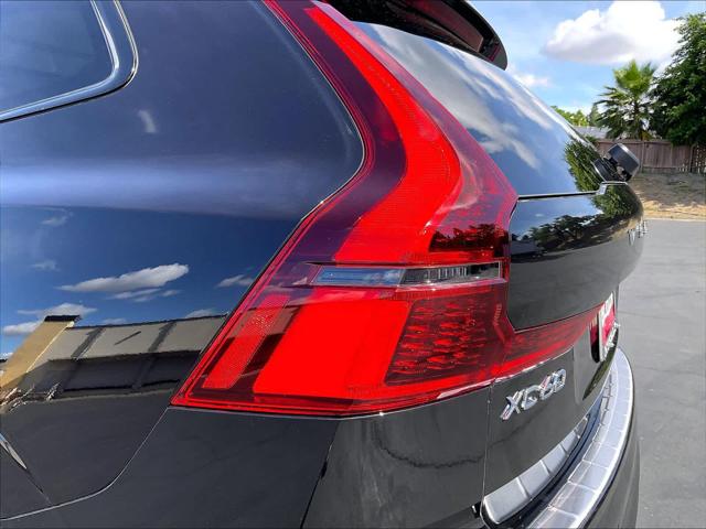 2026 Volvo XC60 Plug-In Hybrid Plus, T8 AWD Electric/Gasoline, Dark