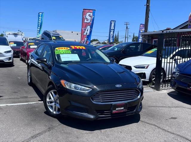 Used 2014 Ford Fusion Sedan 4D SE I4 Specs | JD Power