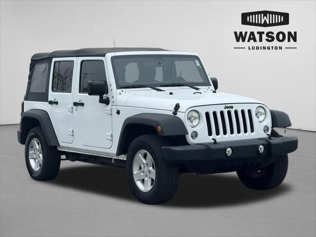 2014 Jeep Wrangler Unlimited Sport for sale in Ludington, MI