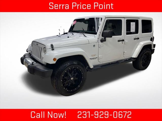 2014 Jeep Wrangler Unlimited Sahara for sale in TRAVERSE CITY, MI