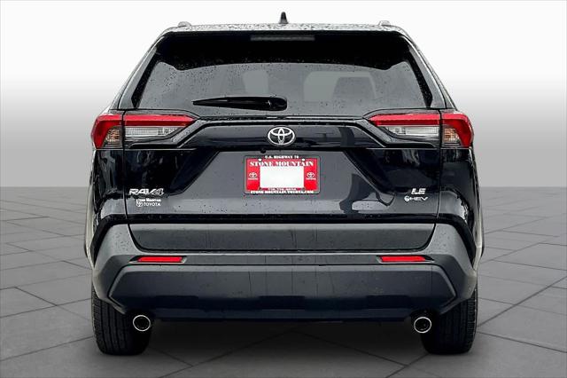 Certified Used 2025 Midnight Black Metallic Toyota Hybrid LE image 39