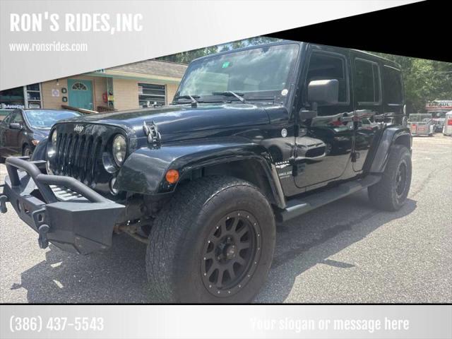 2014 Jeep Wrangler Unlimited Sahara for sale in Bunnell, FL