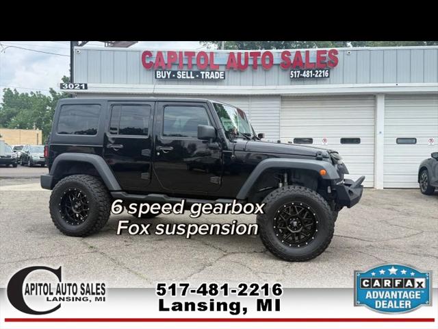 2013 Jeep Wrangler Unlimited Sport for sale in Lansing, MI