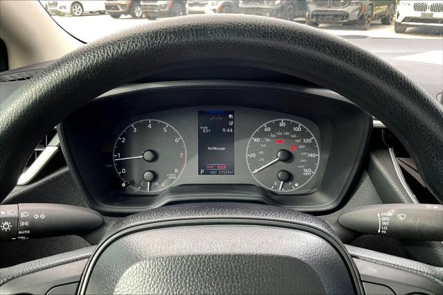 Certified Used 2025 Midnight Black Metallic Toyota LE image 58
