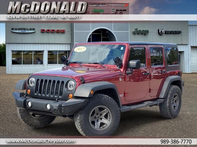 2012 Jeep Wrangler Unlimited Sport for sale in Clare, MI