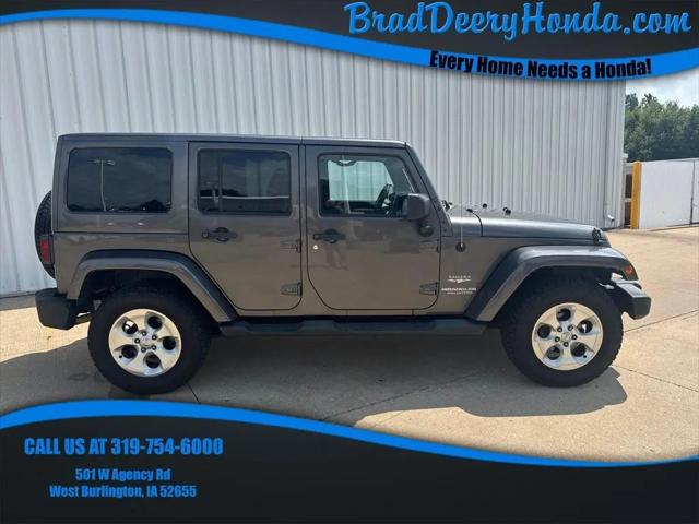 2014 Jeep Wrangler Unlimited Sahara for sale in West Burlington, IA