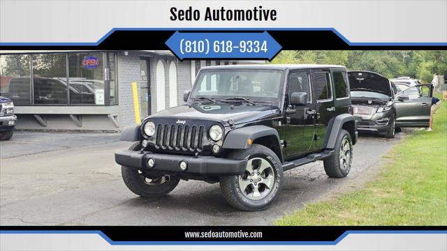 2014 Jeep Wrangler Unlimited Sport for sale in Davison, MI