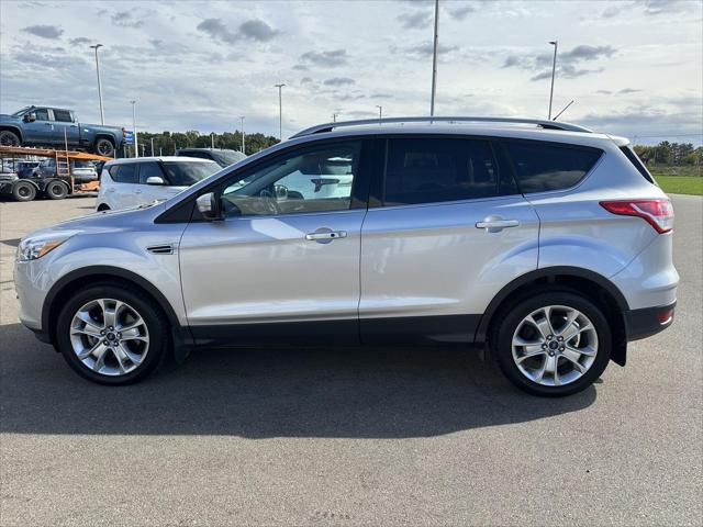 Used 2016 Ford Escape Titanium with VIN 1FMCU9JX6GUA19863 for sale in Jackson, MI