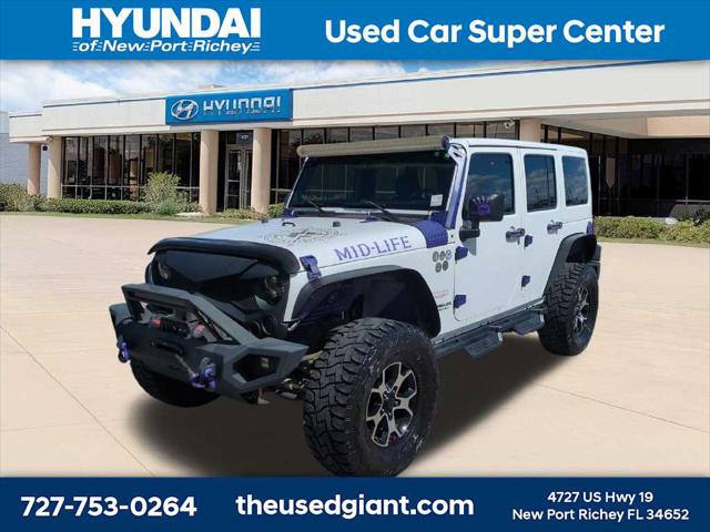 2014 Jeep Wrangler Unlimited Sahara for sale in New Port Richey, FL