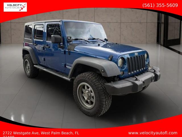 2010 Jeep Wrangler Unlimited Sport for sale in West Palm Beach, FL